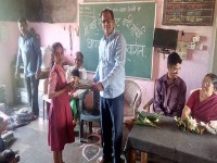 School stationery distribution program-Damini-Neral